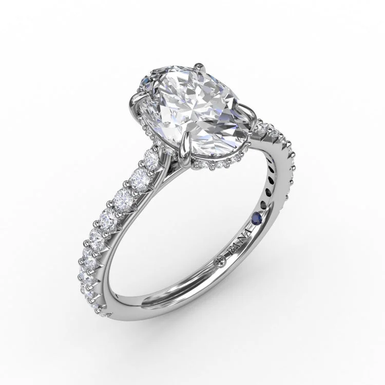 Classic Oval Diamond Solitaire Engagement Ring With Hidden PavÃ© Halo