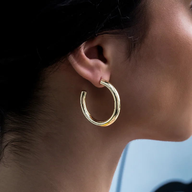 Tube Hoop Earrings in Yellow Gold